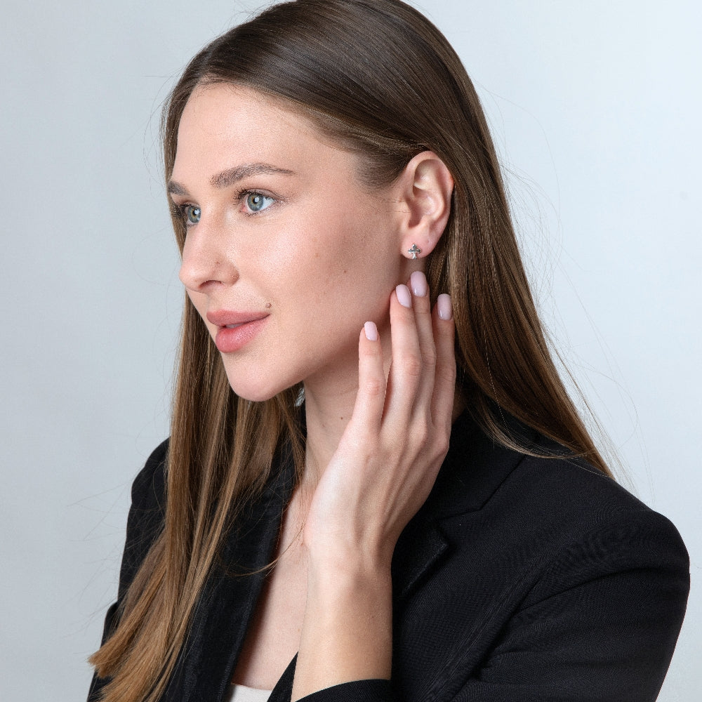 Budded Cross Stud Earrings in 925 Sterling Silver – shown worn
