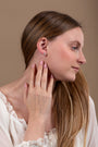 Halo Cross Stud Earrings in 925 Sterling Silver with Cubic Zirconia – shown worn, close-up