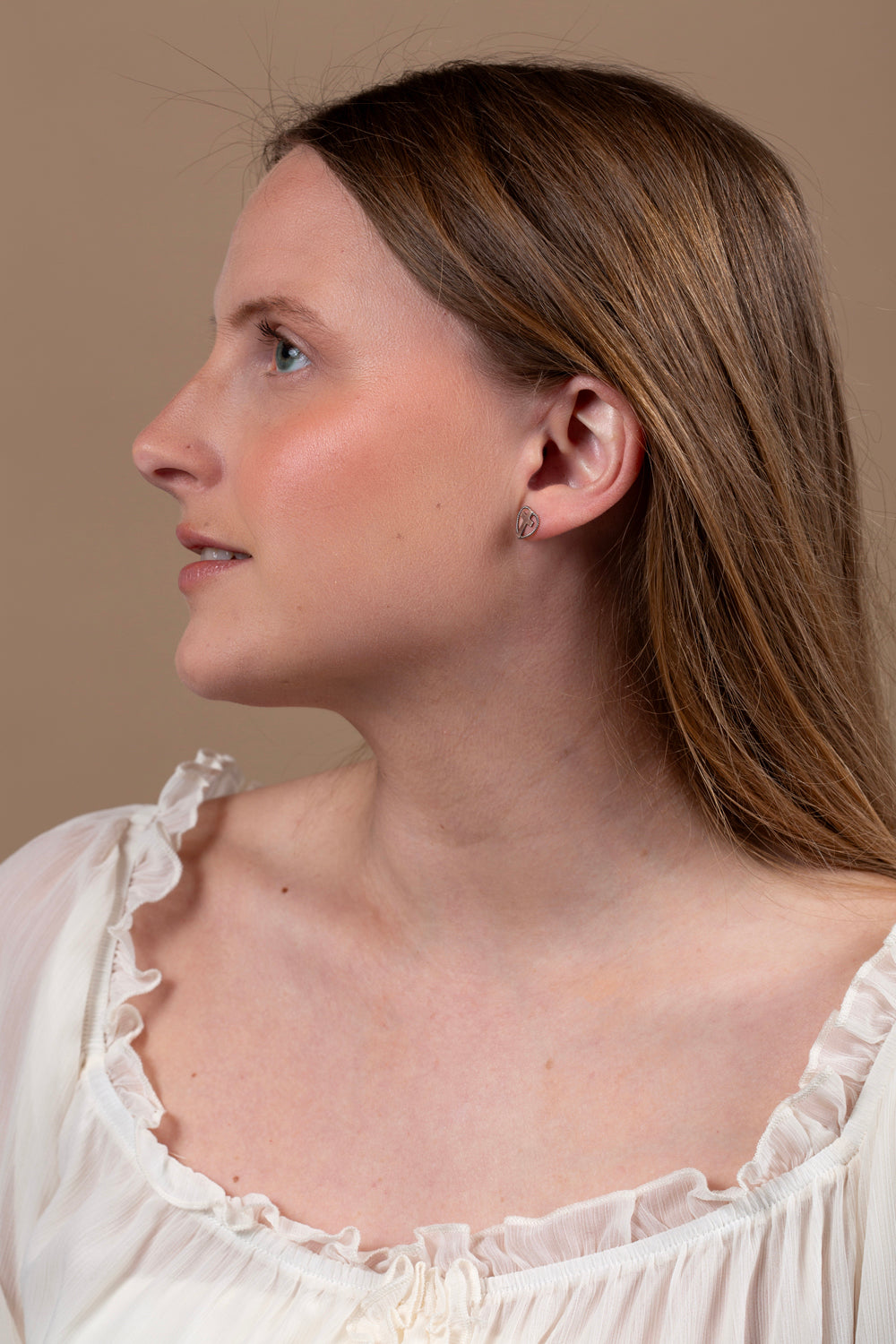Rope Heart & Cross Stud Earrings in 925 Sterling Silver – shown worn