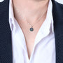 Jerusalem Cross Eilat Stone Disc Pendant Necklace in 925 Sterling Silver – shown worn, close-up