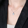 Holy Bible Pendant Necklace, Engraved Latin Cross, 925 Sterling Silver – shown worn, close-up