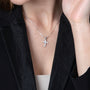 Cubic Zirconia Cross Pendant Necklace in 925 Sterling Silver – shown worn, close-up