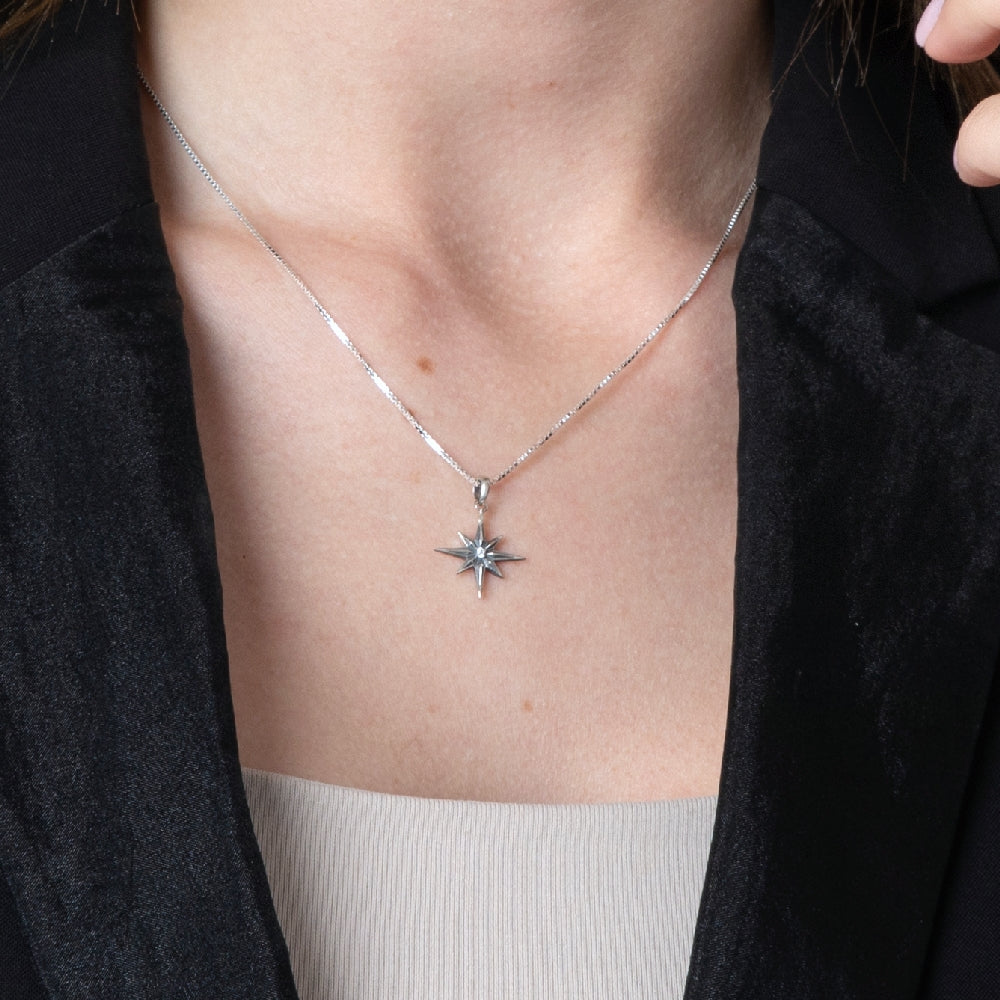 Polished Star of Bethlehem Pendant Necklace in 925 Sterling Silver with Cubic Zirconia – shown worn, close-up