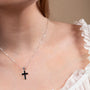Black Onyx Cross Pendant Necklace, Large, Broad Arms, 925 Sterling Silver – shown worn, close-up