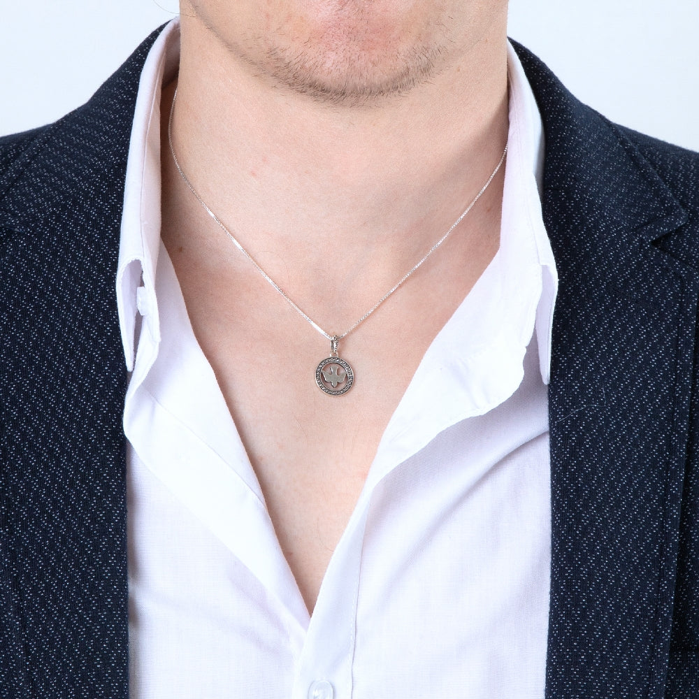 Round Dove Pendant Necklace in 925 Sterling Silver, Beaded Border – shown worn, close-up