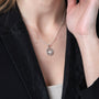 Round Dove Pendant Necklace in 925 Sterling Silver, Beaded Border – shown worn, close-up