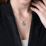Round Dove Pendant Necklace in 925 Sterling Silver, Beaded Border – shown worn, close-up