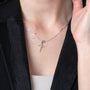 Cross and Dove Pendant Necklace in 925 Sterling Silver, Gold Plated – shown worn, close-up