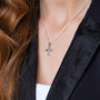 Cross and Dove Pendant Necklace, Beveled Arms, 925 Sterling Silver – shown worn, close-up