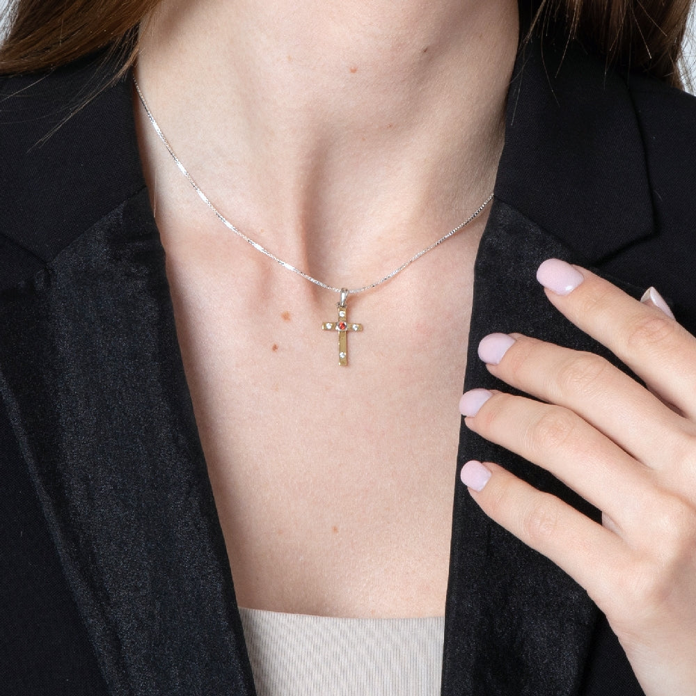 Cross Pendant Necklace in 925 Sterling Silver, Gold Plated with Garnet-Red and Clear Cubic Zirconia – shown worn, close-up