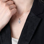 Dotted Cross Pendant Necklace, Flared Oxidized Arms, 925 Sterling Silver – shown worn, close-up
