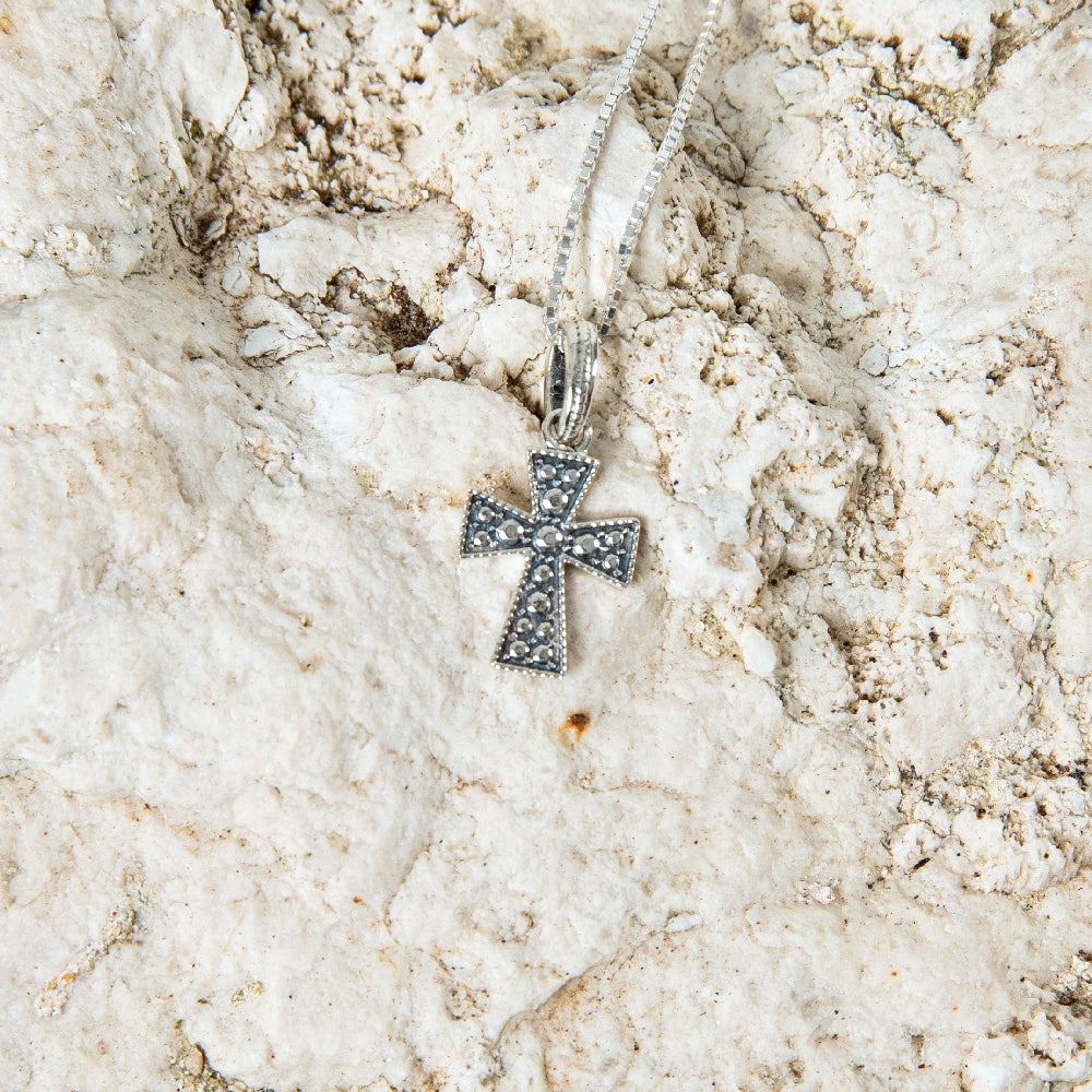 Dotted Cross Pendant Necklace, Flared Oxidized Arms, 925 Sterling Silver – flat lay