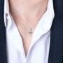Cross with Dove Pendant Necklace in 925 Sterling Silver – shown worn, close-up