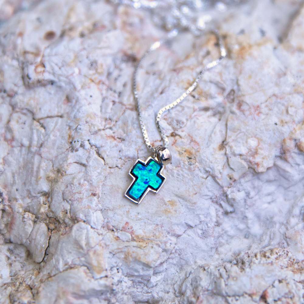Blue Opal Cross Pendant Necklace, Silver Bezel Frame, 925 Sterling Silver – flat lay