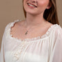 Miraculous Medal Pendant Necklace in Gold-Plated 925 Sterling Silver, Floral Frame – shown worn