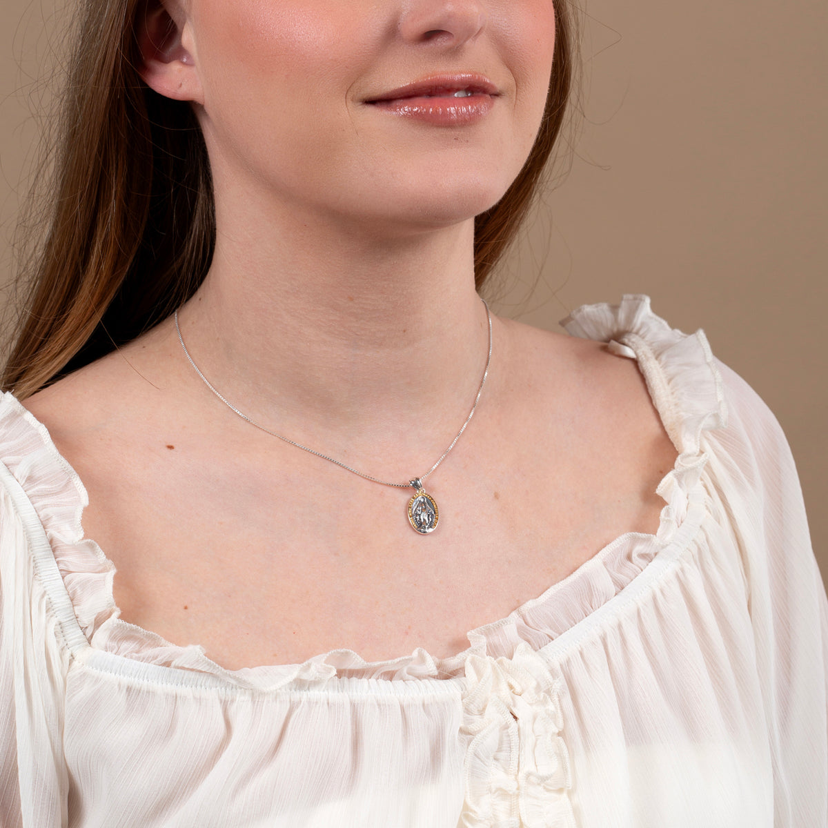 Miraculous Medal Pendant Necklace in 925 Sterling Silver, Gold Frame – shown worn