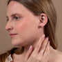 Heart & Dove Stud Earrings in 925 Sterling Silver, Gold-Plated – shown worn