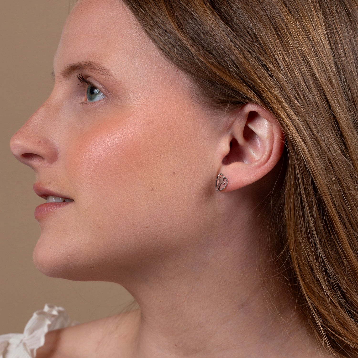 Rope Heart & Cross Stud Earrings in 925 Sterling Silver – shown worn