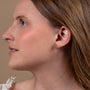 Rope Heart & Cross Stud Earrings in 925 Sterling Silver – shown worn