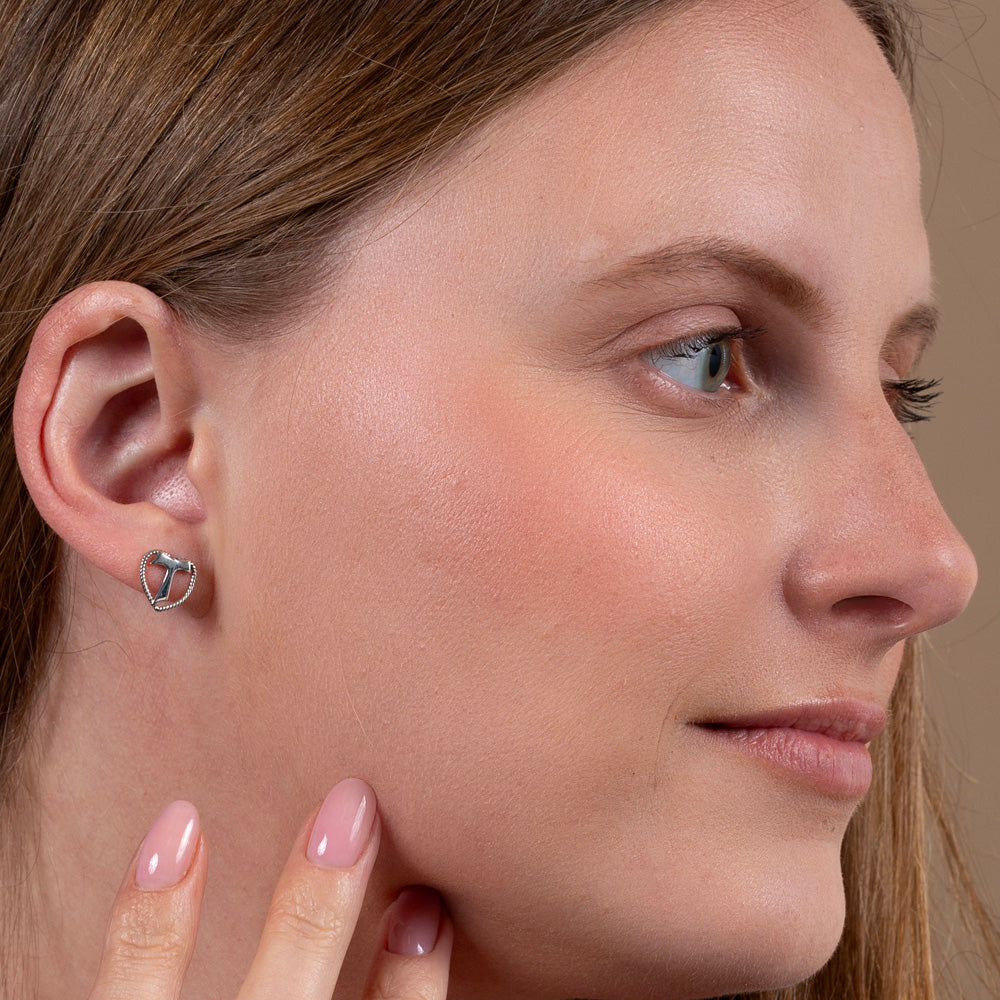 Tau Cross Heart Stud Earrings in 925 Sterling Silver – shown worn