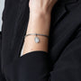 Miraculous Medal Charm in 925 Sterling Silver – shown worn, close-up