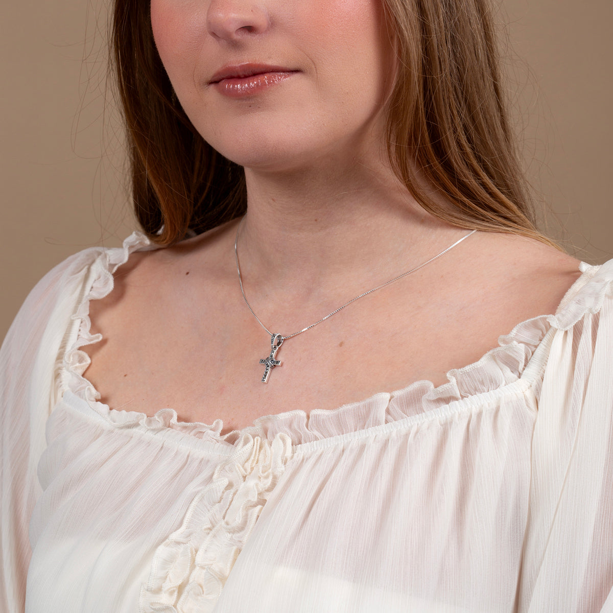 Mini Wrapped Cross Pendant Necklace in 925 Sterling Silver, Marcasite – shown worn
