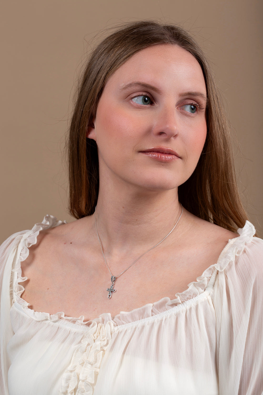 Looped Cross Pendant Necklace in 925 Sterling Silver, Marcasite – shown worn