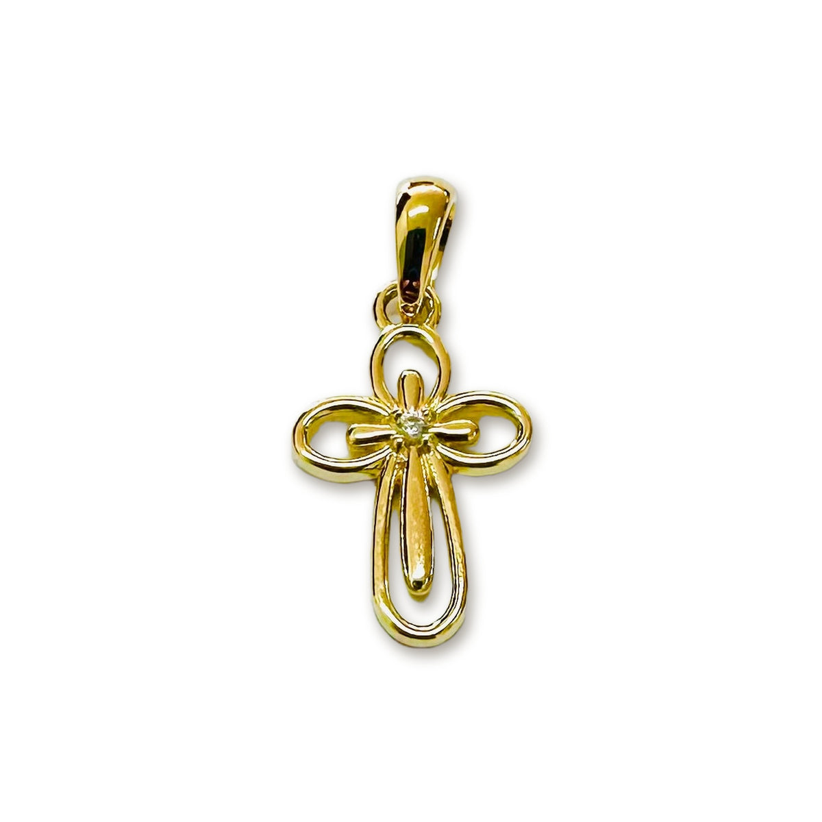14K yellow gold open loop cross pendant with a cubic zirconia center, lying flat on a white surface, by Marina Jewelry